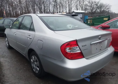 2002 Toyota Camry Le from USA, damaged, VIN 4T1BE32K92U011709